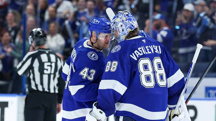 Apr 21, 2026; Tampa, Florida, USA; Tampa Bay Lightning defenseman Darren Raddysh (43) and goaltender Andrei Vasilevskiy (88) react after beating the Montreal Canadiens in overtime during game two of the first round of the 2026 Stanley Cup Playoffs at Benchmark International Arena. Mandatory Credit: Nathan Ray Seebeck-Imagn Images