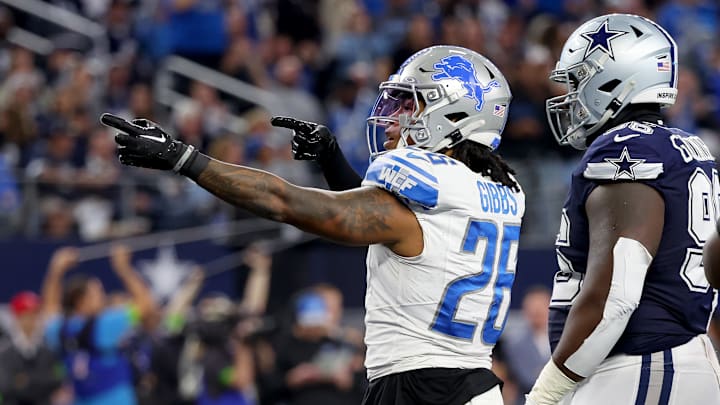 Detroit Lions running back Jahmyr Gibbs signals for a first down against the Dallas Cowboys