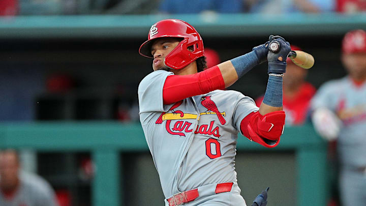 St. Louis Cardinals shortstop Masyn Winn takes a swing at the plate.
