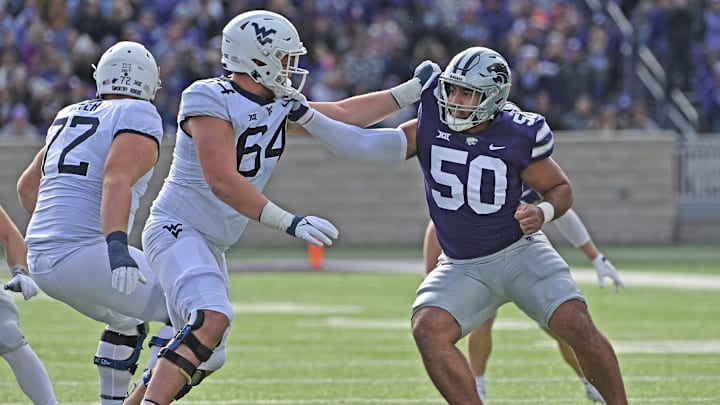Wyatt Milum blocks against Kansas State.