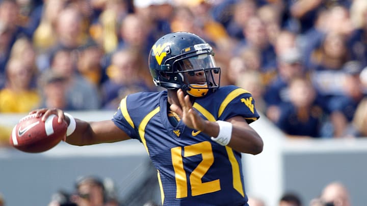 Geno Smith passes the ball during a WVU game.