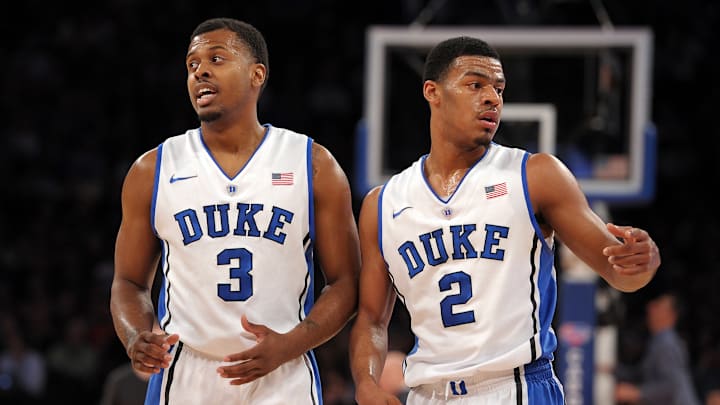 CARQUEST Auto Parts Classic - UCLA v Duke; Duke basketball guard Tyler Thornton and Quinn Cook