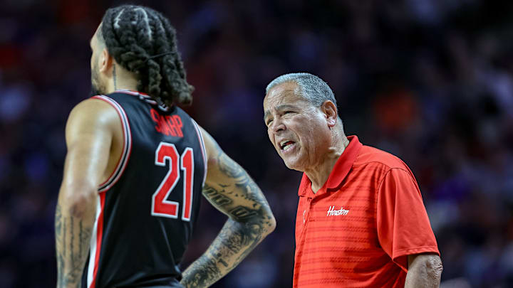 Houston Cougars coach Kelvin Sampson and guard Emanuel Sharp. Houston Cougars coach Kelvin Sampson and guard Emanuel Sharp.