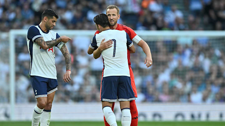 Tottenham Hotspur v FC Bayern Munich - Pre-Season Friendly - Kane and Son embrace their reunion - with Cristian Romero nearby