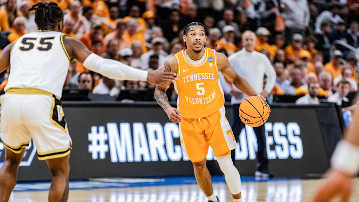 Zakai Zeigler (R) of the Tennessee Volunteers in action...
