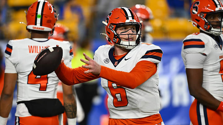 Syracuse QB Kyle McCord warms up versus Pitt.