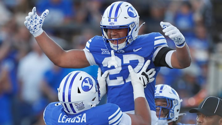 LJ Martin celebrates a late-game score against Arizona.