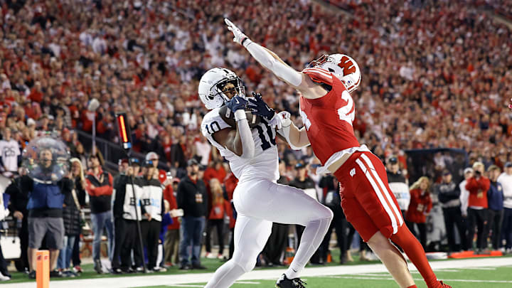 Nicholas Singleton hauls in a one-handed grab against Wisconsin.