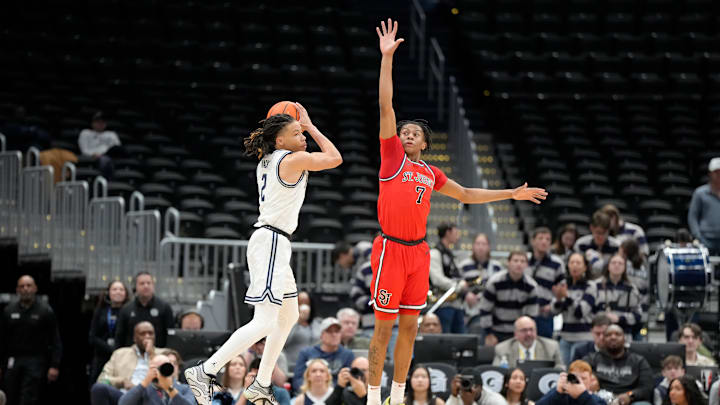 St. John's vs Georgetown; St. John's basketball guard Simeon Wilcher defends a shot against Georgetown guard Malik Mack