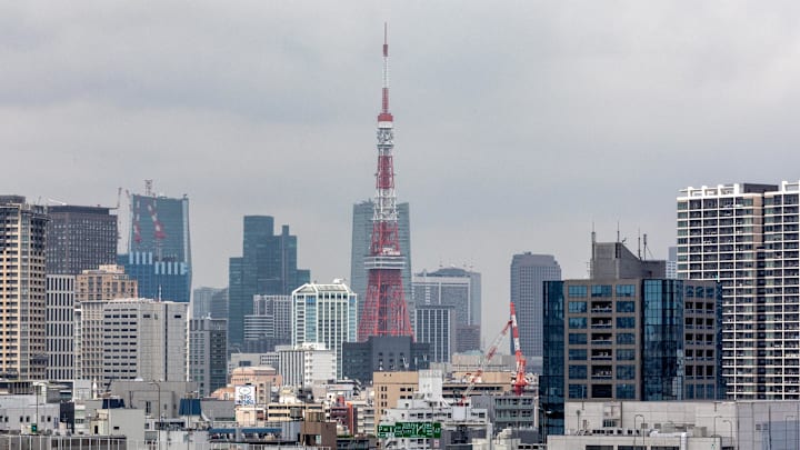 The rainbow bridge seen with the Tokyo tower in the...