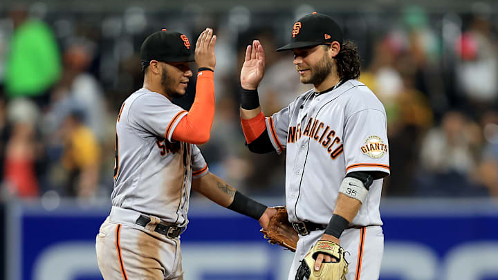 Thairo Estrada and Brandon Crawford