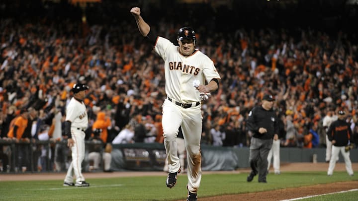 Oct 20, 2010; San Francisco, California; Pat Burrell begins to celebrate at home plate (NLCS/Game 4)