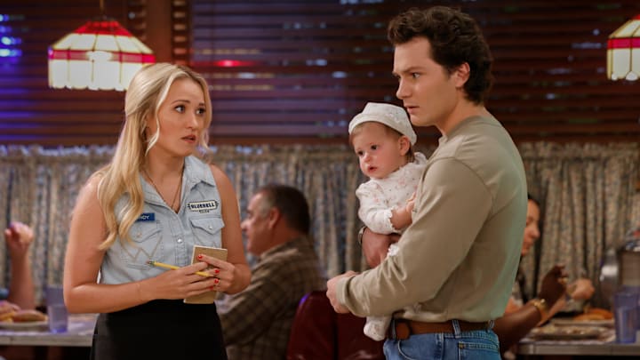 “A Regular Samaritan” – Georgie joins a church to sell tires to the congregation and Mandy worries there is more to it than that, on GEORGIE & MANDY’S FIRST MARRIAGE, Thursday, Dec. 5 (8:00-8:31 PM, ET/PT) on the CBS Television Network, and streaming on Paramount+ (live and on-demand for Paramount+ with SHOWTIME subscribers, or on-demand for Paramount+ Essential subscribers the day after the episode airs)*. Pictured (L-R): Emily Osment as Mandy and Montana Jordan as Georgie 
