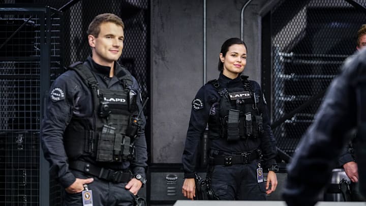 "Miracle" -- Hondo and the SWAT team are forced to work over their Christmas vacation when a drug cartel is out for blood after their cache of gold bars is stolen. Also, Jessica draws the attention of Michael Plank (Peter Facinelli), president of the Police Commission, when she approaches him with her ideas on how to improve the SWAT division, on S.W.A.T., Thursday, Dec. 21 (10:00-11:00, ET/PT) on the CBS Television Network. Pictured left to right: Alex Russell as Jim street, and Lina Esco as