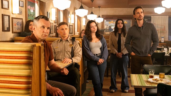 Pictured: Sean Bell as Punch Elliot, Matt Lauria as Nathan Boone, Amanda Arcuri as Skye Fraley and Christopher Gorham as Tarvis Fraley in Sheriff Country. Photo: Christos Kalohoridis/CBS ©2025 CBS Broadcasting, Inc. All Rights Reserved.