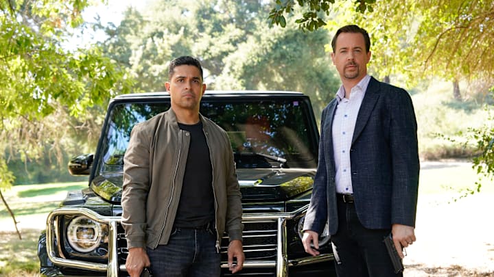 “Knight and Day” – Things become tense when Knight is assigned to protect his wife after the home of a high-level defense contractor is attacked, on the CBS Original series NCIS, Monday, Nov. 25 (9:00-10:00 PM, ET/PT) on the CBS Television Network, and streaming on Paramount+ (live and on-demand for Paramount+ with SHOWTIME subscribers, or on-demand for Paramount+ Essential subscribers the day after the episode airs)*. Pictured (L-R): Wilmer Valderrama as NCIS Special Agent Nicholas “Nick”