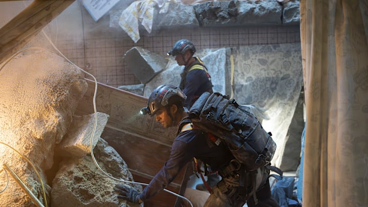 9-1-1 - “Seismic Shifts” - The 118, still reeling from their recent loss, is dispatched to a mass casualty event after a high-rise apartment building collapses. Then, Athena and Chimney have to work together to save a familiar face.THURSDAY, MAY 15 (8:00-9:00 p.m. EDT) on ABC. (Disney/Christopher Willard) 
ANIRUDH PISHARODY, OLIVER STARK