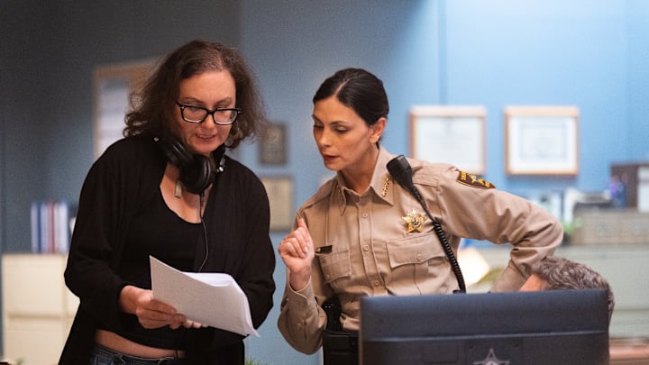 "Pilot" - Sheriff Country. PIctured: Script Supervisor Jeannine Dupuy and Morena Baccarin. Photo: Brooke Palmer/CBS ©2025 CBS Broadcasting, Inc. All Rights Reserved.