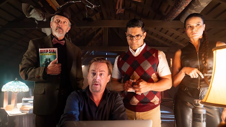 “Page-Turner” – Pictured: Gary Cole as Alden Parker / Professor Parkman, Sean Murray as Timothy McGee / McGregor, Wilmer Valderrama as S.S. Nicolas Torres / Rick Soares and Katrina Law as NCIS S.A. Jessica Knight / Knightingdale. Photo: Bill Inoshita/CBS ©2025 CBS Broadcasting, Inc. All Rights Reserved. “Page-Turner” – Pictured: Gary Cole as Alden Parker / Professor Parkman, Sean Murray as Timothy McGee / McGregor, Wilmer Valderrama as S.S. Nicolas Torres / Rick Soares and Katrina Law as NCIS S.A. Jessica Knight / Knightingdale. Photo: Bill Inoshita/CBS ©2025 CBS Broadcasting, Inc. All Rights Reserved.