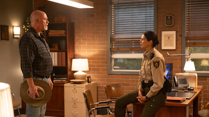 “Crucible, Part 1” – Pictured: Michael Gaston as Enoch Barlow and Morena Baccarin as Sheriff Mickey Fox. Photo: Christos Kalohoridis/CBS ©2025 CBS Broadcasting, Inc. All Rights Reserved. “Crucible, Part 1” – Pictured: Michael Gaston as Enoch Barlow and Morena Baccarin as Sheriff Mickey Fox. Photo: Christos Kalohoridis/CBS ©2025 CBS Broadcasting, Inc. All Rights Reserved.