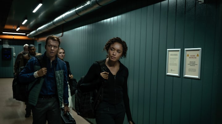 “South of Nowhere” – L-R: Todd Lasance as AFP Liaison Officer Sergeant Jim 'JD' Dempsey, Tuuli Narkle as AFP Liaison Officer Constable Evie Cooper, and Olivia Swann as NCIS Special Agent Captain Michelle Mackey in NCIS: Sydney episode 9, season 3 streaming on Paramount+, 2025. Photo Credit: Daniel Asher Smith/Paramount+ © TM & © 2025 CBS Studios Inc. NCIS: Sydney and related marks and logos are trademarks of CBS Studios Inc. All Rights Reserved.