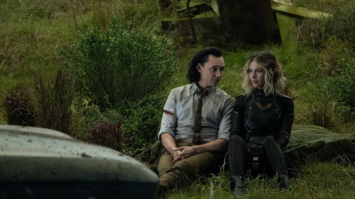 (L-R): Loki (Tom Hiddleston) and Sylvie (Sophia Di Martino) in Marvel Studios' LOKI, exclusively on
