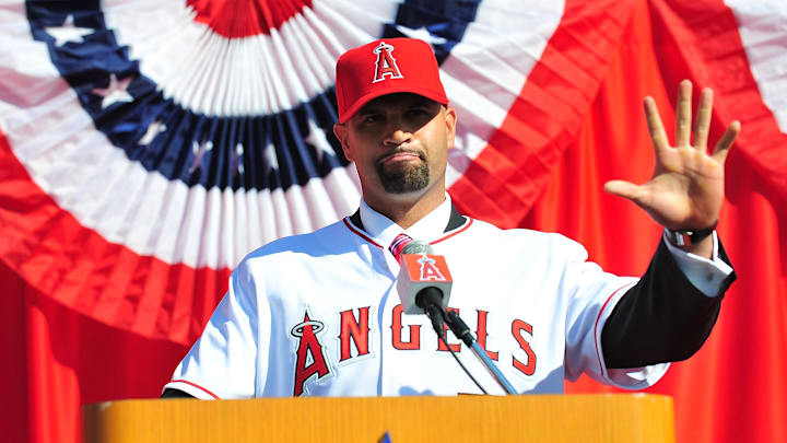December 10, 2011; Anaheim, CA, USA; Los Angeles Angels first baseman Albert Pujols speaks at a press conference at Angel Stadium. Mandatory Credit: Gary A. Vasquez-Imagn Images December 10, 2011; Anaheim, CA, USA; Los Angeles Angels first baseman Albert Pujols speaks at a press conference at Angel Stadium. Mandatory Credit: Gary A. Vasquez-Imagn Images