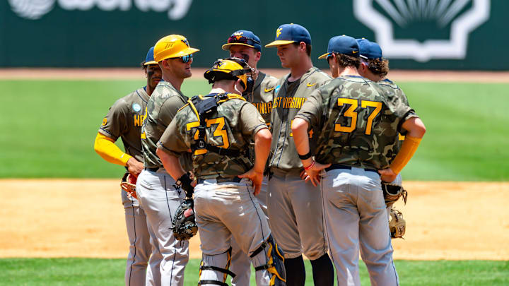 West Virginia Head Coach Steve Sabins visits the mound as The LSU Tigers take on the West Virginia Mountaineers in game 1 of the 2025 NCAA Div 1 Super Regional Baseball Championship at Alex Box Stadium in Baton Rouge, LA. Saturday, June 7, 2025.