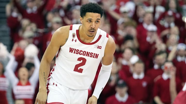Feb 18, 2023; Madison, Wisconsin, USA;  Wisconsin Badgers guard Jordan Davis (2) runs back on defense after scoring during the first half against the Rutgers Scarlet Knights at the Kohl Center. Mandatory Credit: Kayla Wolf-Imagn Images