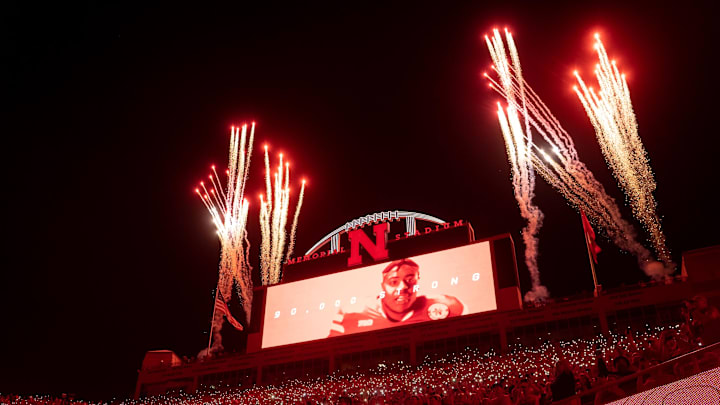 Fireworks go off during a light show at the end of the third quarter at Memorial Stadium. 
