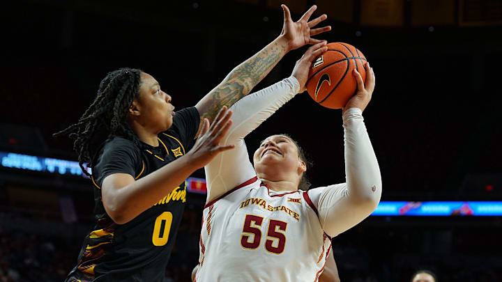 Iowa State Cyclones' center Audi Crooks (55) shoots the ball around Arizona State Sun Devils guard Gabby Elliott (0) during the third quarter in the Big-12 women’s basketball at Hilton Coliseum on Feb. 18, 2026, in Ames, Iowa
