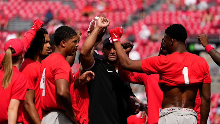 Sep 16, 2023; Columbus, Ohio, USA; Cornerbacks coach Tim Walton warms up his players for the NCAA