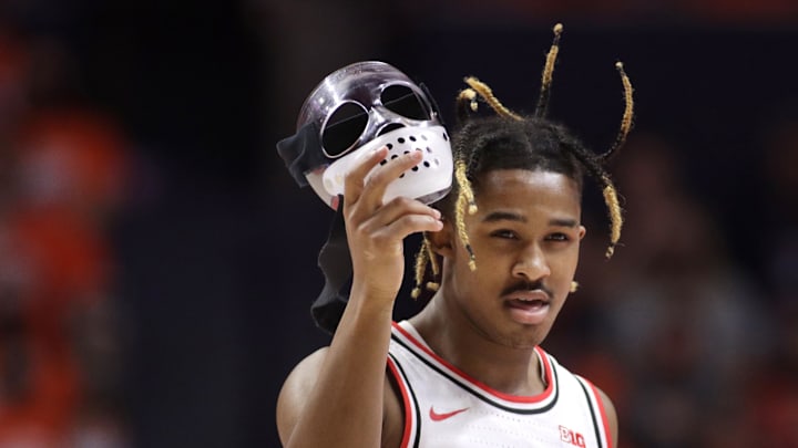 Feb 24, 2022; Champaign, Illinois, USA;  Ohio State Buckeyes guard Meechie Johnson Jr. (0) removes