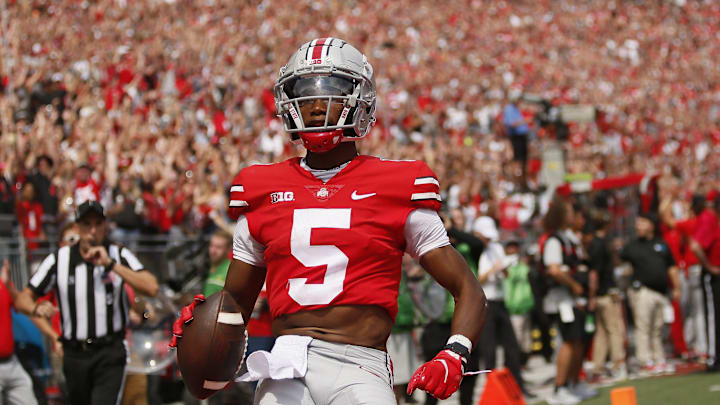 Ohio State Buckeyes wide receiver Garrett Wilson (5) catches a touchdown pass during the first half of the NCAA football game against the Oregon Ducks at Ohio Stadium in Columbus on Saturday, Sept. 11, 2021.

Oregon Ducks At Ohio State Buckeyes Football