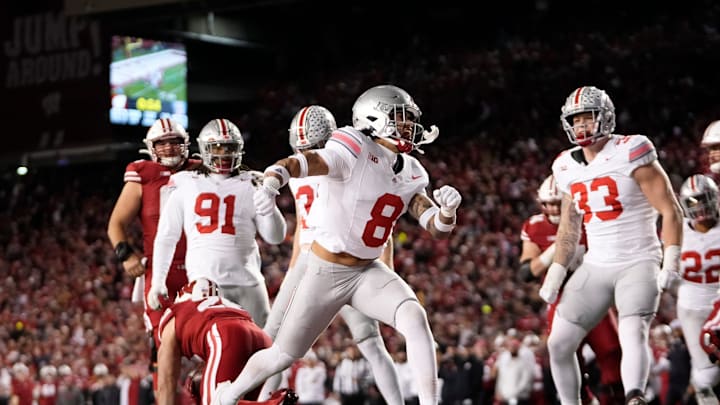 Ohio State safety Lathan Ransom (8) celebrates a defensive stop against Wisconsin at Camp Randall Stadium during the Buckeyes' 24-10 win.