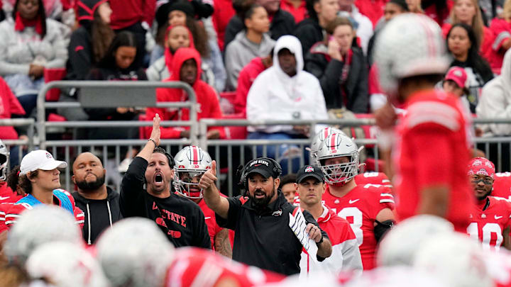 Oct 1, 2022; Columbus, Ohio, USA; Ohio State Buckeyes head coach Ryan Day calls a play into quarterback C.J. Stroud (7) in the second quarter of the NCAA Division I football game between the Ohio State Buckeyes and the Rutgers Scarlet Knights at Ohio Stadium.

Osu22rut Kwr 36