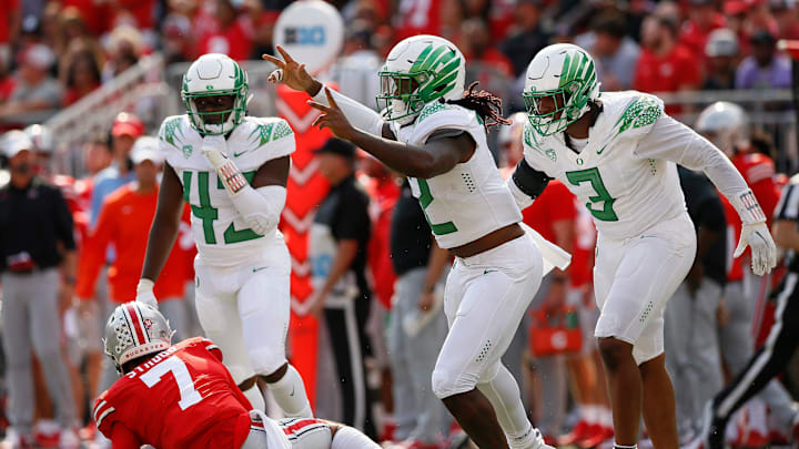 Oregon defensive end DJ Johnson celebrates a sack of Ohio State quarterback C.J. Stroud to end the game Saturday. The Buckeyes had the ball twice in the fourth quarter while trailing by seven points and couldn't score.

Oregon Ducks At Ohio State Buckeyes Football