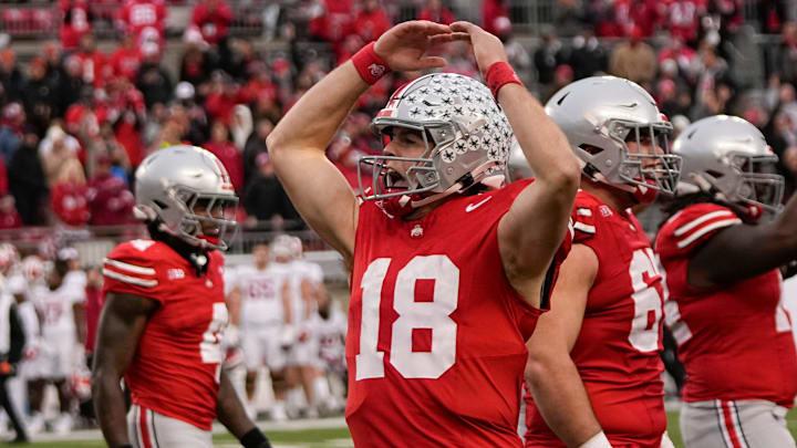 Ohio State Buckeyes quarterback Will Howard (18) celebrates during the second half of the NCAA football game against the Indiana Hoosiers at Ohio Stadium in Columbus on Saturday, Nov. 23, 2024. Ohio State won 38-15.
