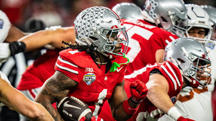Ohio State Buckeyes running back Quinshon Judkins (1) runs the ball in the second quarter as the Texas Longhorns play the Ohio State Buckeyes in the Cotton Bowl College Football Playoff semi-final at AT&T Stadium in Dallas, Texas, Jan. 10, 2025.