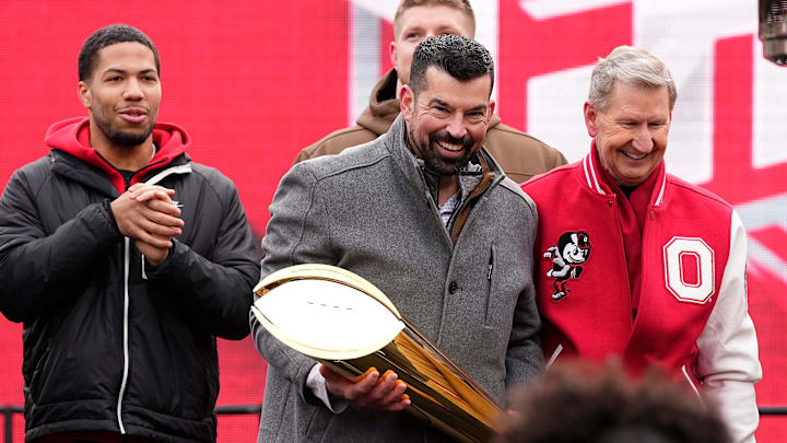 Ohio State Buckeyes head coach Ryan Day holds the College Football Playoff trophy during the Ohio State Buckeyes National Championship celebration at Ohio Stadium in Columbus on Jan. 26, 2025.