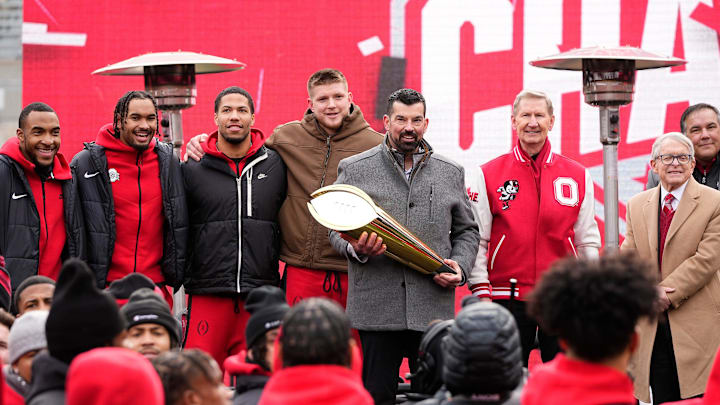 Ohio State Buckeyes head coach Ryan Day holds the College Football Playoff trophy during the Ohio State Buckeyes National Championship celebration at Ohio Stadium in Columbus on Jan. 26, 2025.