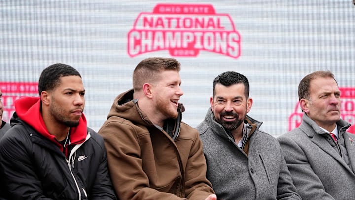 Ohio State Buckeyes head coach Ryan Day laughs with defensive end Jack Sawyer during the Ohio State Buckeyes College Football Playoff National Championship celebration at Ohio Stadium in Columbus on Jan. 26, 2025.