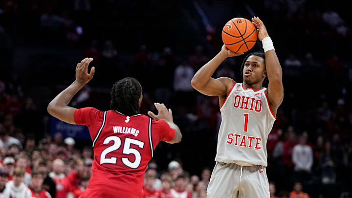 Ohio State Buckeyes guard Meechie Johnson Jr. (1) shoots over Rutgers Scarlet Knights guard Jeremiah Williams (25) during the second half of the NCAA men's basketball game at Value City Arena in Columbus on Saturday, Dec. 7, 2024. Ohio State won 80-66.