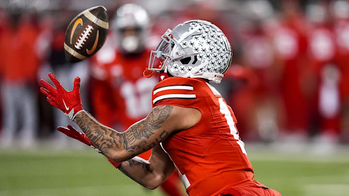 Ohio State wide receiver Brandon Inniss (11) makes a catch during a College Football Playoff first round game between Tennessee and Ohio State held at Ohio Stadium in Columbus, Ohio, on Saturday, Dec. 21, 2024.