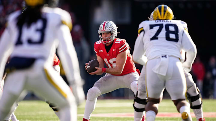 Ohio State Buckeyes quarterback Will Howard (18) takes a snap during the second half of the NCAA football game against the Michigan Wolverines at Ohio Stadium in Columbus on Saturday, Nov. 30, 2024. Michigan won 13-10.