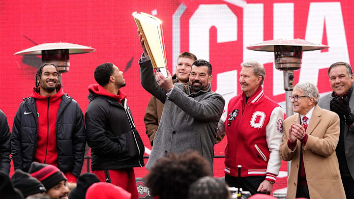 Ohio State Buckeyes head coach Ryan Day hoists the College Football Playoff trophy during the Ohio State Buckeyes National Championship celebration at Ohio Stadium in Columbus on Jan. 26, 2025.