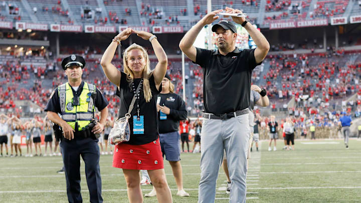 Ohio State Buckeyes head coach Ryan Day and his wife Nina Day sing \"Carmen Ohio\" following the NCAA football game against the Tulsa Golden Hurricane at Ohio Stadium in Columbus on Saturday, Sept. 18, 2021. Ohio State won 41-20.
Tulsa At Ohio State Football Ohio State Buckeyes head coach Ryan Day and his wife Nina Day sing \"Carmen Ohio\" following the NCAA football game against the Tulsa Golden Hurricane at Ohio Stadium in Columbus on Saturday, Sept. 18, 2021. Ohio State won 41-20.
Tulsa At Ohio State Football