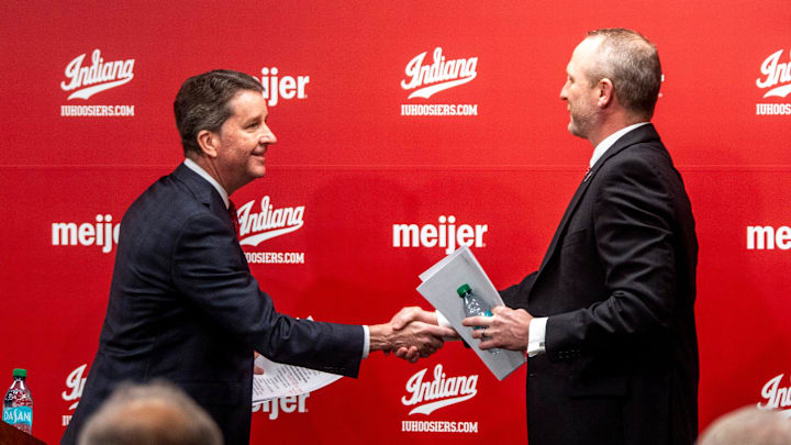 Indiana University Vice President and Director of Intercollegiate Athletics Scott Dolson introduces new men's basketball Head Coach Darian DeVries at the introductory press conference at Simon Skjodt Assembly Hall on Wednesday, March 19, 2025.