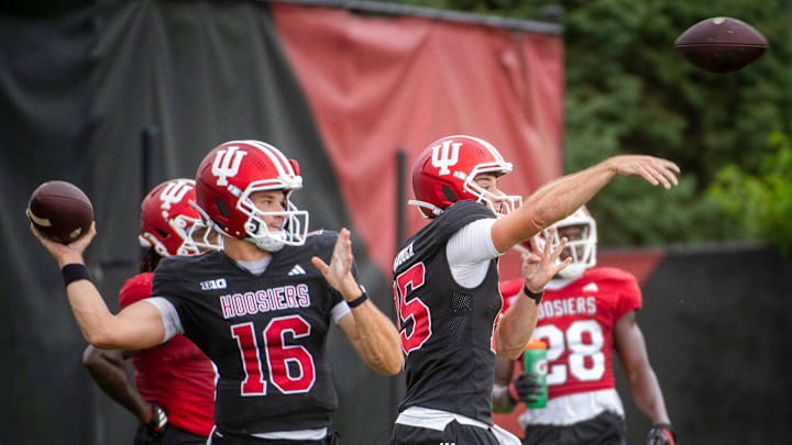 Indiana's Alberto Mendoza (16) and Fernando Mendoza (15) at Indiana University football practice on Monday, Aug. 4, 2025.