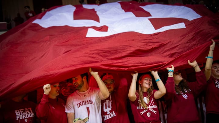 Indiana fans wave a giant flag during the Indiana versus Purdue women's basketball game at Simon Skjodt Assembly Hall on Saturday, Feb. 15, 2025.